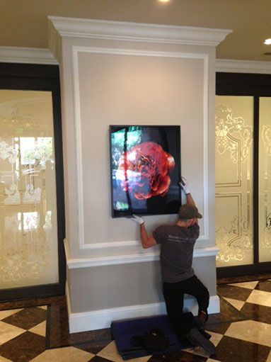 Image of Art Installer - KM Art Advisory - Kimberly Marrero